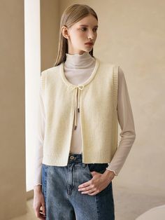 Composition : acrylic 40 nylon 30 polyester 30Color : beige, navyCountry of Origin : China Cream Sweater Vest For Winter Layering, Cream Knitted Sweater Vest For Fall, Fall Cream Knitted Sweater Vest, Knitted Cream Sweater Vest For Fall, Knit Vest, Composition, Jackets & Coats, China, Knitting