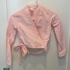 Ballet Long Sleeve Wrap Pink Top. Kids Large. No Tags But Unworn. Stretch Long Sleeve Tops For Playwear, Fitted Long Sleeve Tops For Playwear, Fitted Tops For Fall Playwear, Ballet Pink Tops, Pink Long Sleeve Tops For Playtime, Pink V-neck Workout Tops, Pink V-neck Sports Top, Ballet Wrap Top, Ballet Top