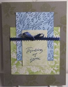 a handmade greeting card with two birds on it