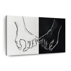 two hands holding each other's hand in black and white canvas wall art print