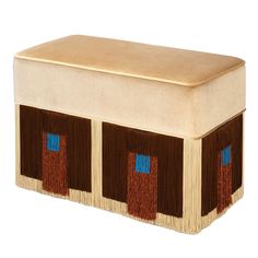 a large wooden box with two brown and blue squares on the front, sitting against a white background