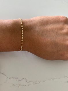 Gold Flat Beaded Bracelet | 14K Gold Filled Delicate Bracelet | Gold Bracelet | Bridal Bracelet | Bridesmaid Gift | Layering Bracelet Minimalist | Gold-filled Bracelets -------------------------------------------------- ♦ ------------------------------------------The beautiful Flat Beaded Bracelet, is one of our popular pieces within the YanYa collection. It can help dress up any wardrobe and is a piece that can be worn on its own or as part of a layer combination of chains. If you are looking f Delicate Bracelet Gold, Bracelet Measurements, Bracelet Minimalist, Gold Flats, Bridesmaid Bracelet, Bridal Bracelet, Dainty Bracelets, Layered Bracelets, Bracelet Gold