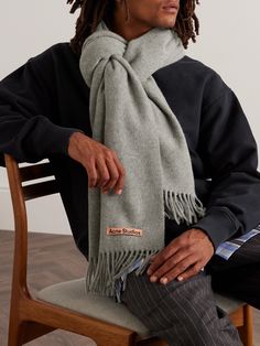 Acne Studios' iconic fringed scarf is practically an essential of the cool winter wardrobe. It has been knitted in Italy from RWS-certified wool and detailed with the house's pink logo tab. Men Knitting Scarf, Cool Winter Wardrobe, Mens Cotton Scarf, Acne Scarf, Mens Scarf, Scarf For Men, Plain Scarves, Cool Winter, Acne Shop