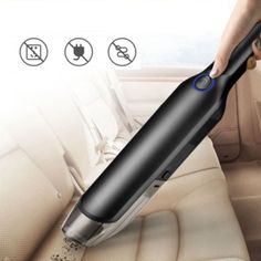 an electric car vacuum is being used to clean the interior