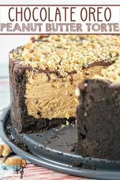 there is a chocolate cake with nuts on the top and one slice missing from it