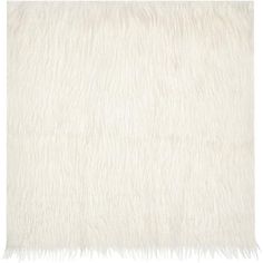 a white rug with shaggy fur on the top and bottom part, in an angled position