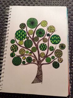 a drawing of a tree with lots of green leaves