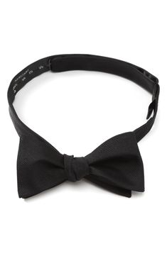 Look extra charming at your next formal event in this dapper self-tie bow tie cut from pure silk. 2" x 40" Self-tie; adjustable 100% silk Dry clean Imported Pre-tied Satin Bow For Black Tie Events, Classic Adjustable Bow Ties, Dapper Adjustable Tie With Satin Bow, Dapper Adjustable Satin Bow Tie, Adjustable Satin Bow Tie In Dapper Style, Dapper Adjustable Bow For Black Tie Events, Classic Black Tie Event Bow Tie, Adjustable Dapper Bow For Black Tie Events, Pre-tied Decorative Bow Tie For Black Tie Events