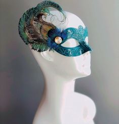 Enchant and captivate with our exquisite women's masquerade mask in teal! This opulent mask perfectly blends the allure of teal elegance with the majestic beauty of peacock feathers, making you the star of every masquerade affair. From grand masquerade balls to soirées and elegant celebrations, our women's masquerade mask is the perfect choice.


Age Group/Gender - Adult/Women's

Size/Type - One size fits all adults

Mask Color - Teal

Mask Material - Plastic

Accent Material - Paint

Special Fe Peacock Mascarade Mask, Turquoise Mask Masquerade Ball, Masks Feathers, Peacock Masquerade, Blue Masquerade Mask, Peacock Mask, Madi Gras, Feather Mask, Masquerade Masks