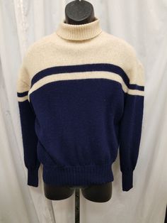 Vintage 1960's Cream Penney's Towncraft Turtleneck Pullover Thick Sweater Blue Striped Acrylic Long Sleeve Mod Rare! Large.  Top is in excellent condition (see pics)! Measurements: shoulder to shoulder 20 in, chest 40 in, sleeves 22, back of neck to bottom length 25, waist 22 stretch to 30 in. Vintage Crew Neck Outerwear For Winter, Retro Winter Polo Sweater With Ribbed Collar, Retro Polo Sweater With Ribbed Collar For Winter, Vintage Wool Sweater For Winter, Cream Retro Winter Sweater, Retro Winter Tops With Ribbed Collar, Retro Tops With Ribbed Collar For Winter, Vintage Polo Sweater With Ribbed Collar And Crew Neck, Vintage Wool Crew Neck Sweater