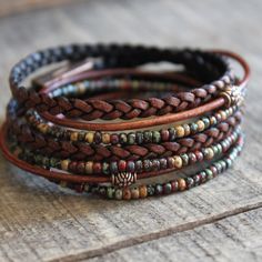 "So excited ,I love the new style of this wrap bracelet! Similar to my bestseller, but better! Smaller Miyoki beads ... Make it a comfortable bracelet , Layering, stack, Boho Wrap Bracelet, Leather Bracelet, Leather Beaded Wrap, Bohemian Style, A great wrap bracelet for woman ,men , everyone Napa leather braided, multi cord bracelet. A unique combination of beautiful Miyoki and Czech seed beads, Along with Copper Beads ,combine to make this 3x wrap bracelet. It is adorned with a magnetic clasp t Leather Wrap Bracelets, Bracelet Layering, Beaded Leather Wraps, Beaded Leather Bracelet, Boho Wrap Bracelet, Artisan Bracelets, Beaded Wrap Bracelets, Bracelet Leather, Rustic Jewelry