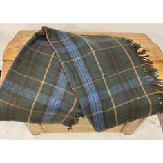 Super Soft Merino Lambswool Knee Rug/Blanket In A Classic Green And Blue Tartan Plaid Pattern- Made In England.  Our knee blankets are cut to a smaller size then a traditional throw which is perfect for laying across your knees, dressing furniture, wrapping around your shoulders and bringing along as a travel blanket.  Established in 1837 with over 180 years of proud British manufacturing & design heritage already to our name, They are one of Great Britain’s last remaining vertical woolen mills. Furniture Wrapping, Tartan Throws, Plaid Throw Blanket, Navy Blanket, Travel Blanket, Plaid Throw, Blue Tartan, Plaid Blanket, Brown Plaid