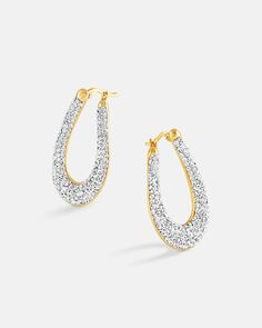 This is a mid-sized hoop earring set with over 300 pcs of micro pavé crystals. The design is elegant, sophisticated and a lot of sparkle and bling. The earring uses the crystal luster setting technique which creates lusters that shines and sparkles. This earring is made in 18K yellow gold or white gold plated over 925 sterling silver. Each piece is hand polished to perfection. Closure: Hoop Stamp Approx. Measurement: Outer Length: 1.4 inches Outer Width: 35 inches Silver Weight: Approx. 0.18 oz Hoop Earring Set, Bamboo Hoop Earrings, Elegant Sophisticated, Hoop Earring Sets, Earring Sale, Shop Earrings, Post Earrings, Earring Set, Jewelry Pieces