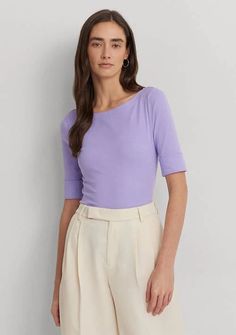 This timeless wardrobe staple is crafted with stretch-infused cotton and features an “LRL” monogram at the hem for a signature Lauren style. Slim fit Intended to hit at the hip Size medium has a 25 body length and an 11.5 sleeve length Body length is taken from the high point of the shoulder Sleeve length changes 0.25 between sizes Boat neck Elbow-length sleeves with folded cuffs Embroidered “LRL” monogram at the right hem Side-split hem Model is 5'10 (178 cm) and wears a size small By choosing Ralph Lauren Fitted Tops For Workwear, Ralph Lauren Fitted Workwear Tops, Ralph Lauren Summer Workwear Tops, Ralph Lauren Spring Tops For Workwear, Ralph Lauren Spring Workwear Tops, Classic Tops For Spring, Classic Elastane Tops For Spring, Summer Fitted Ralph Lauren Tops, Fitted Ralph Lauren Summer Tops