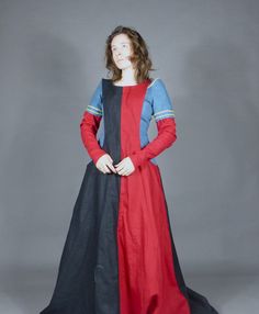 Two Colour Linen Medieval 14th Century Women's Over Coat Surcoat  Ladies would often dress up there kirtle by wearing and sucoat over the top witch could be styled simply or made lavishly with fur trims and fancy fabric.  We offer a simple style surcoat with a low hanging side openings which is made from your chosen coloured 100% linen fabrics colours in the pictures .  You can either choose the surcote to be lined on the inside in a cream cotton or have no lining witch is a cheaper option.  We Fall Medieval Dress Costume With Historical Design, Long Sleeve Medieval Dress For Costume Party, Medieval Long Sleeve Costumes For Festivals, Medieval Dress For Fantasy Events In Fall, Medieval Costume For Larp In Fall, Fantasy Costumes With Long Sleeves For Medieval Festivals, Fantasy Costumes For Medieval Festivals With Long Sleeves, Long Sleeve Medieval Dress For Costume Party In Fall, Historical Costume Dresses For Fall