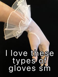 a person wearing white gloves with the words i love these types of gloves sm