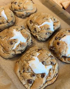 chocolate chip cookies with marshmallows and white icing