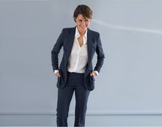 Idyllic presents a stylish, high quality blazer, perfect for events or office wear. This blazer has a shawl collar and a single button closure. It it made out of fine fabric, it has flap and welt pockets and two side slits on the back. The length gives it an elegant but masculine look. You can wear this blazer with our tapered or straight, or slightly flared pants available on our website. The model is fully lined. Composition: blazer - 75% polyester, 20% wool, 5% elastane; inner lining - 100% viscose. Delivery time: 1-2 weeks. The product can be adjusted based on the client's silhouette and style. Feel free to contact us with anything you have in mind! Tuxedo Style Single-button Blazer For Office, Tuxedo Blazer With Single Button For Office, Tuxedo Style Office Blazer With Single Button, Tuxedo Style Blazer For Work With Pockets, Tuxedo Blazer With Lapel Collar And Pockets, Professional Blazer With Lapel Collar For Office, Tuxedo Style Office Blazer With Pockets, Office Tuxedo Blazer With Pockets, Professional Blazer With Suit Collar For Business Meetings