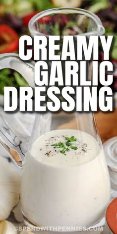 creamy garlic dressing in a pitcher with text overlay that reads creamy garlic dressing