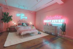 a pink bedroom with neon lights and a bed in the corner that says, saturday night fever