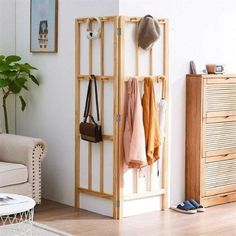 a coat rack in the corner of a room