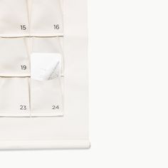 a white piece of cloth with numbers on it