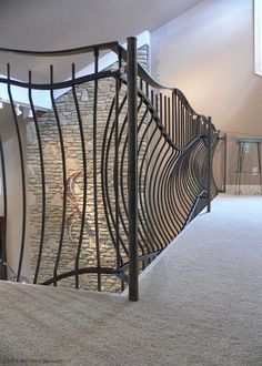 an iron railing in the middle of a room