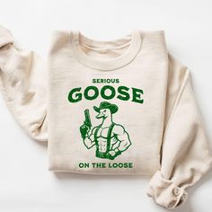 Silly Goose On The Loose Sweatshirt, Funny Goose Shirt, Cute Goose Sweatshirt, Funny Gift For Her, Duck Shirt, Funny Sweatshirt, Retro Shirt ORDERING PROCESS 👕➡️🛍 Here's how you can easily place your order: * Choose the color and size for your product, please reference the sizing chart in each listing. * Decide how many you'd like. * Fill in the personalization details, if needed. * Add the items to your Cart. * Review and choose any shipping upgrades. * Finalize your order at checkout. PLEASE Meme Chat, Raccoon Shirt, Raccoon Funny, Cat Sweatshirt, Sports Sweatshirts, Funny Sweatshirts, Jesus Shirts, Clothes Horse, Vintage Sweatshirt