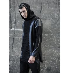 Introducing our avant-garde Black Raven Hoodie, a masterpiece of unique fashion. Crafted from super soft cotton, this hoodie blends two different fabrics, exuding street high fashion. Embrace the allure of the dark side with silver studs and faux leather stripes, making a bold statement. The hood features faux leather lining, adding an edgy touch to your style. With a longer back side and functional zippers on the elbow, you can achieve a chic and trendy look effortlessly. Two pockets with zippe Black Futuristic Hooded Jacket With Long Sleeves, Futuristic Black Long Sleeve Hooded Jacket, Black Futuristic Long Sleeve Hooded Jacket, Futuristic Black Hooded Jacket With Long Sleeves, Black Punk Hoodie Outerwear, Black Cyberpunk Hooded Jacket For Fall, Cyberpunk Black Hooded Jacket For Fall, Black Futuristic Hooded Jacket For Winter, Futuristic Black Hooded Winter Jacket