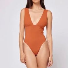 New With Tags L*Space Katniss One Piece Classic Seam-Free Swimsuit In Amber. Size S. Completely Seamless With Thick Straps + A Wide U-Back, This Suit Move With You While Hugging Every Curve. Seam-Free One Piece Wide Straps Wide U Back Darts At Bust. Classic Coverage Orange Bodysuit For Poolside And Beach Season, Summer Swimming Bodysuit In Orange, Summer Orange Bodysuit For Swimming, Orange Sleeveless Bodysuit For Beach Season, Sleeveless Orange Bodysuit For Vacation, Orange Summer Bodysuit For Poolside, Fitted Orange Bodysuit For Pool, Spring Orange Bodysuit For Poolside, Orange Sleeveless Bodysuit For Summer