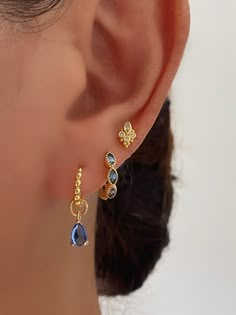 Blue And Silver Ear Piercings, Hoop Earrings Sets, Cute Gold Earring Stacks, Blue And Gold Earring Stack, Earing Ideas Gold, Gold Earrings With Stones, 3 Ear Piercings Gold, Gold And Blue Earrings, Blue Earring Stack