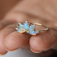 14K Gold Pear Opal Ring, Dainty Wedding Gemstone Band Ring, Stacking Engagement Ring, Gemstone Ring For Her, Diamond Ring, Pear Tiara Ring, Gemstone Band RingProduct info:14k solid goldnatural diamond - white diamondwhite diamonds, I color, SI claritywhite diamonds - 0.05 ct, I, SI clarityOpal :0.65 ct, NaturalRing Size 7Item will be resized and shipped within 10 days.ITEM Will BE SHIPPED : India Speed PostTo get the item in 4-5 days, we can also ship it thru DHL express, please contact us befor Cluster Gemstone Diamond Ring For Wedding, Cluster Diamond Ring With Accent Stones For Wedding, Cluster Birthstone Ring With Gemstone For Wedding, Wedding Diamond Ring With Cluster Accent Stones, Wedding Cluster Diamond Ring With Accent Stones, Gold Cluster Birthstone Ring For Wedding, Wedding Cluster Diamond Ring With Gemstone, Cluster Birthstone Rings For Weddings, Wedding Cluster Rings With Birthstone