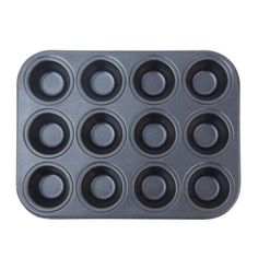 an empty muffin pan with nine holes on the front and one hole in the middle