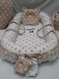 a baby crib with teddy bears on it