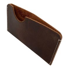 SLIM FIT CARD HOLDER: The Hide & Drink Card Holder is handcrafted from top quality, 100% full grain leather. The material is sturdy and durable lending this wallet a classy, slim, and attractive look. Shed the excess weight and bulk of unnecessary cards and coins for this lightweight card sleeve that can carry your essential cards and cash. Fit just what you need comfortably into your back pants pocket or even an inner-coat pocket. A great long lasting gift that keeps on giving. HIDE & DRINK’S 1 Brown Leather Lined Card Holder For Daily Use, Brown Leather-lined Card Holder For Daily Use, Brown Leather-lined Card Holder For Everyday Use, Brown Leather Lined Card Holder, Brown Card Holder With Card Slots For Everyday Carry, Brown Leather Card Holder With Waxed Finish, Classic Brown Wallets With Waxed Finish, Classic Brown Wallet With Waxed Finish, Iron Holder