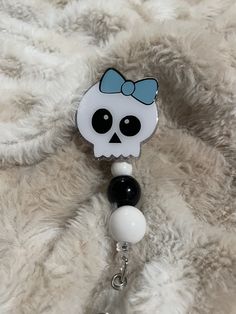 😉  My items are handmade with love using acrylic, resin, glitters and mica powders.  This badge reel measures approx 2 1/2 inches and has sparkle!  so cute!! Attached to an alligator swivel clip and beaded to match!   If you have any questions, just message me.   Thanks for visiting my shop! Halloween Gift Black Badge Reel, Nurse Crafts, Handmade Novelty Pink Badge Reel, Retractable Keychain Badge Reel, Girl Skull, Black Badge Reel, Halloween Gift, Car Vent Clip, Nursing Teacher, Car Vent