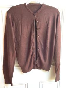 This authentic 1970's vintage brown cardigan sweater is in good condition with a little pilling. It is long sleeved with buttons up the front. Bust-36 inches Length-23 inches Sleeve-25 inches To see more of our vintage 1970's clothing inventory please visit our store at ChoiceRecycling.  We add new items every week. Thank you, Karmyn Womens Hooded Sweater, Hooded Sweater Coat, 1970s Clothing, Brown Cardigan Sweater, Penny Lane Coat, Brown Cardigan, Womens Jackets, Floral Shirt Dress, Brown Jacket