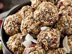 a bowl filled with cookies and nuts on top of a table