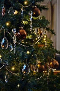 a christmas tree decorated with ornaments and lights