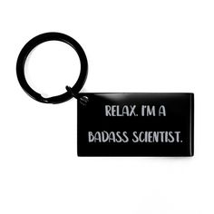 Looking for a durable and high-quality keychain that is perfect for Scientist Look no further than our Scientist Keychain! Crafted from high-quality stainless steel, this keychain is designed to withstand daily wear and tear, ensuring that your keys stay safe and secure at all times. With its sleek black color and rectangular shape measuring 1.57 x 0.87 inches, our keychain is the perfect accessory for any outfit or bag. And with its durable construction, it is the perfect gift idea for men, women, teens, daughters, moms, dads, best friends, or girlfriends. Crafted from high-quality stainless steel, our keychain is highly resistant to rust, corrosion, and discoloration, ensuring that it looks great for years to come. And with its engraved Scientist message, it is a thoughtful and meaningfu Preacher Gifts, Birthday Keychain, Scientist Birthday, Scientist Gifts, Black Keychain, Science Teacher Gifts, Graduation Presents, Fancy Gifts, Presents For Friends