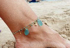 》》》 DESCRIPTION Looking for the perfect Mermaid complement? You found it 😊 These anklet is made with blue or blue and green beads and blue or teal sea glass. - The sea glass used to make this jewel is 100% genuine and recycled, tumbled by the sea, and it was handpicked by myself in Barcelona beach, in Spain. :) 》》》 PLEASE READ CAREFULLY 《《《 ♡ The item is packaged in a lovely and reusable jewelry box/bag. ♡ All shippings are certified; you'll be able to track the item and see where it is at ever Sea Glass Crafts Jewellery, Sea Glass Anklet, Beach In Spain, Barcelona Beach, Marble Rings, Sea Glass Ring, Beachglass Jewelry, Sea Glass Crafts, Green Beads