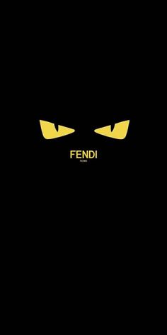 the face of a black cat with yellow eyes and words on it that read fendi