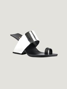 Metallic Sandals With Wrapped Heel For Summer, Metallic Summer Sandals With Wrapped Heel, Summer Metallic Sandals With Wrapped Heel, Modern Silver Sandals With Ankle Strap, Modern Evening Sandals With Single Toe Strap, Designer Silver Heels For Summer, Modern Sandals With Heel Strap And Toe Loop, Modern Patent Leather Heels With Single Toe Strap, Modern Metallic Sandals For Evening