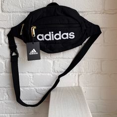 Nwt Adidas Black Belt Bag New With Tags Adidas Black And White Belt Bag Gold Zippers Adjustable Strap Top Zip Closure Exterior Front Zip Pocket Inside Lined 100 % Recycled Polyester White Belt Bag, Pink And White Adidas, Black Belt Bag, Adidas Black And White, Pink Duffle Bag, Adidas Backpack, Adidas Bags, Leather Belt Bag, White Belt