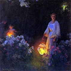 a woman holding a lantern in a garden at night