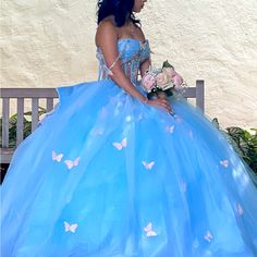 Beautiful Quinceanera, Baby Blue Dress With Rose, Gold, Peach Tone, Butterflies, Hint Of Silver All Over The Dress Amazing Gown One-Of-A-Kind It's Considered A One Size Because It's A Corset Top Pictures Do You Know Justice Worn For Pictures And Birthday Party Small Tear On One Of The Sheer Lace Can Be Fixed Can Send More Pictures Still In Amazing Condition Paid Over 5600 But I Am Willing To Work Out Reasonable Pricing Can Also Add Crowns And Bouquet. Also Shoes If Needed Let Me Know If You Would Like More Close-Up Pictures. The Bow In The Back Is Removable. Open To Reasonable Prices. Pale Blue Quinceanera Dress, Blue Tulle Quinceanera Dress, Blue Tulle Dress For Sweet 16, Blue Princess Quinceanera Dress For Prom Season, Fitted Blue Quinceanera Dress For Sweet 16, Blue Ball Gown For Sweet 16, Princess Style Blue Quinceanera Ball Gown, Blue Tulle Gown For Sweet 16, Blue Princess Quinceanera Dress For Debutante Ball