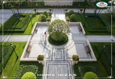 an aerial view of a garden with trees and bushes in the center, surrounded by hedges