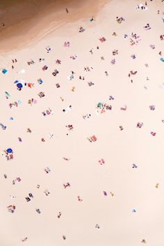 an aerial view of people on the beach