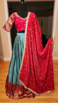 Sea Green Banaras lehanga with big border red maggam work blouse comes with chiffon dupatta with all over butties and 4 sides border. size: 36 to 40in Red Raw Silk Traditional Wear With Sheer Dupatta, Red Dola Silk Sharara With Sheer Dupatta, Red Banarasi Silk Lehenga With Sheer Dupatta, Red Art Silk Anarkali Set With Sheer Dupatta, Red Dola Silk Anarkali Set With Sheer Dupatta, Red Dola Silk Sets With Sheer Dupatta, Red Banarasi Silk Saree With Sheer Dupatta, Red Dola Silk Lehenga With Sheer Dupatta, Red Lehenga With Sheer Dupatta In Art Silk