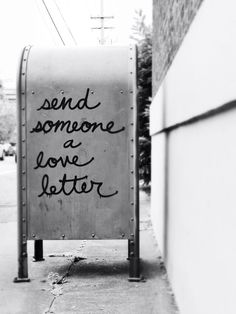 a mailbox with the words send someone love letter written on it